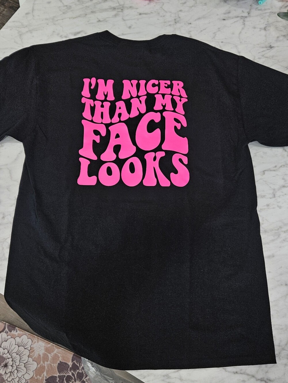 Funny shirt I'm nicer than my face looks humor black and pink retro